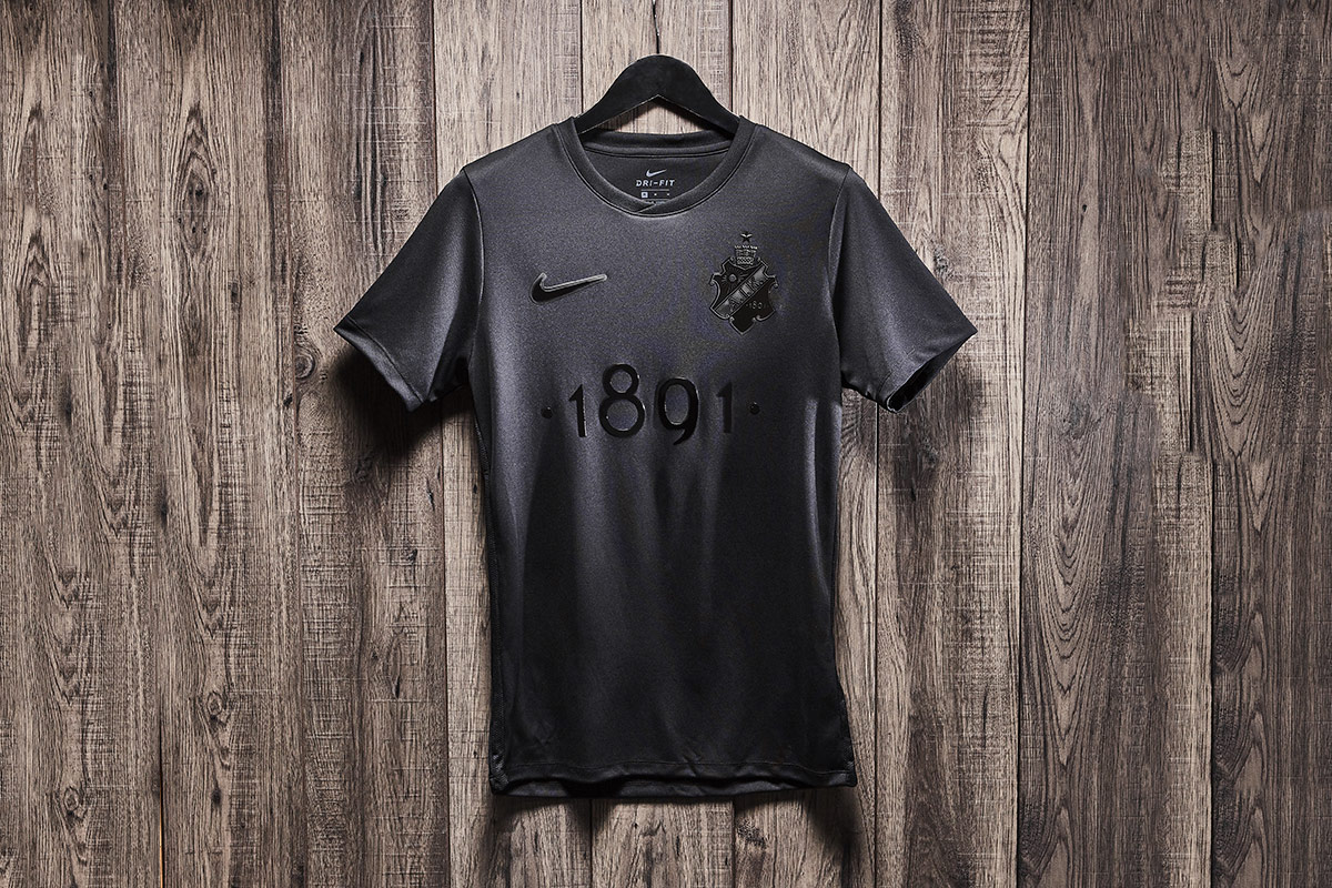 black nike soccer shirt